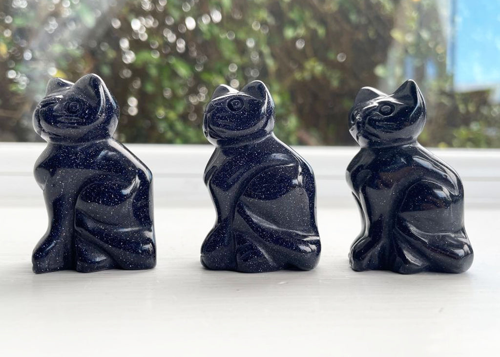 Carved And Polished Blue Goldstone Cat