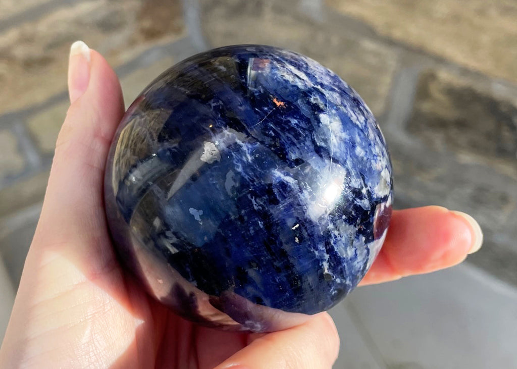 Large Polished Sodalite Sphere With Hematite Inclusions