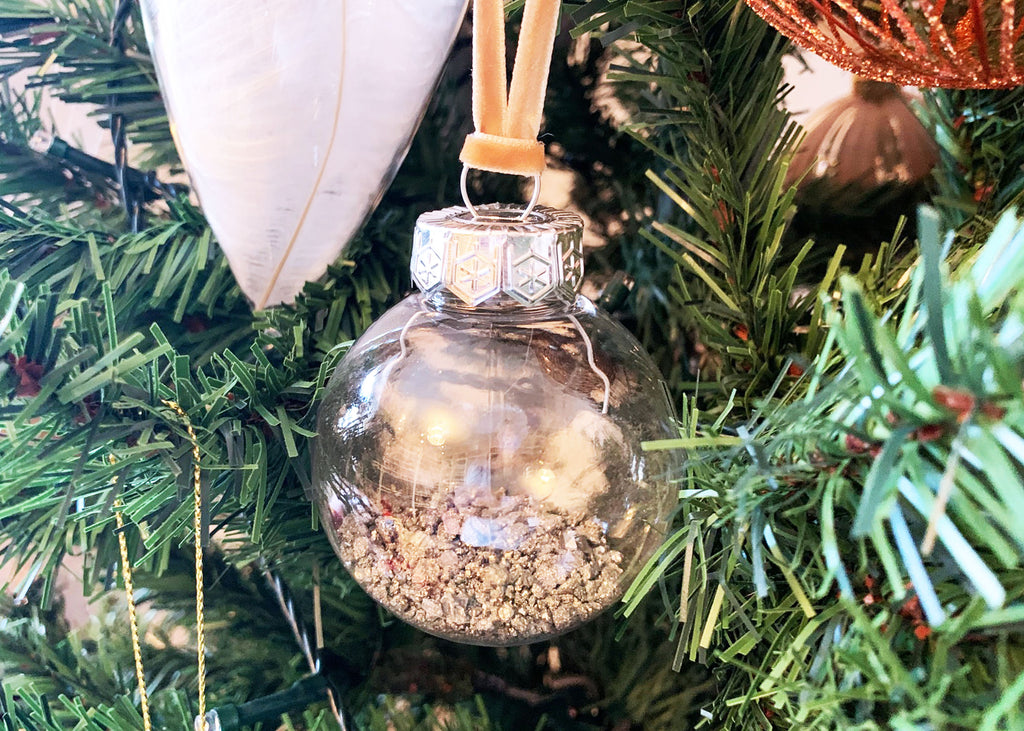 Pyrite Crystal Bauble Hanging On A Christmas Tree